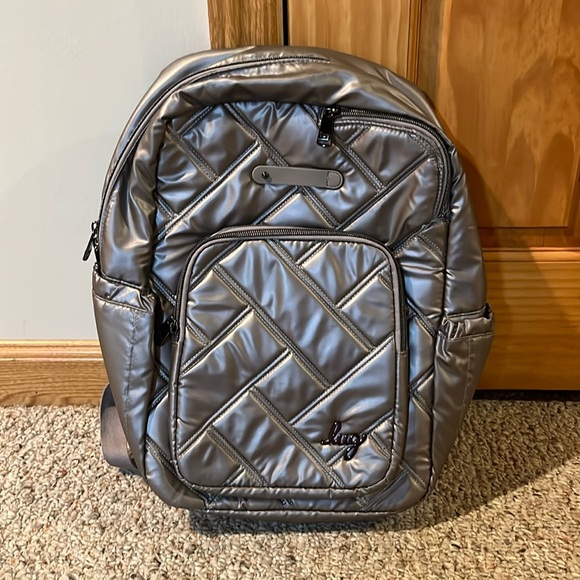 lug Handbags - Lug Roadster Backpack in Metallic Pearl